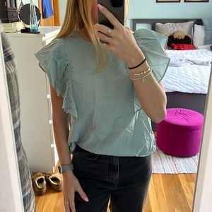 Light teal blouse